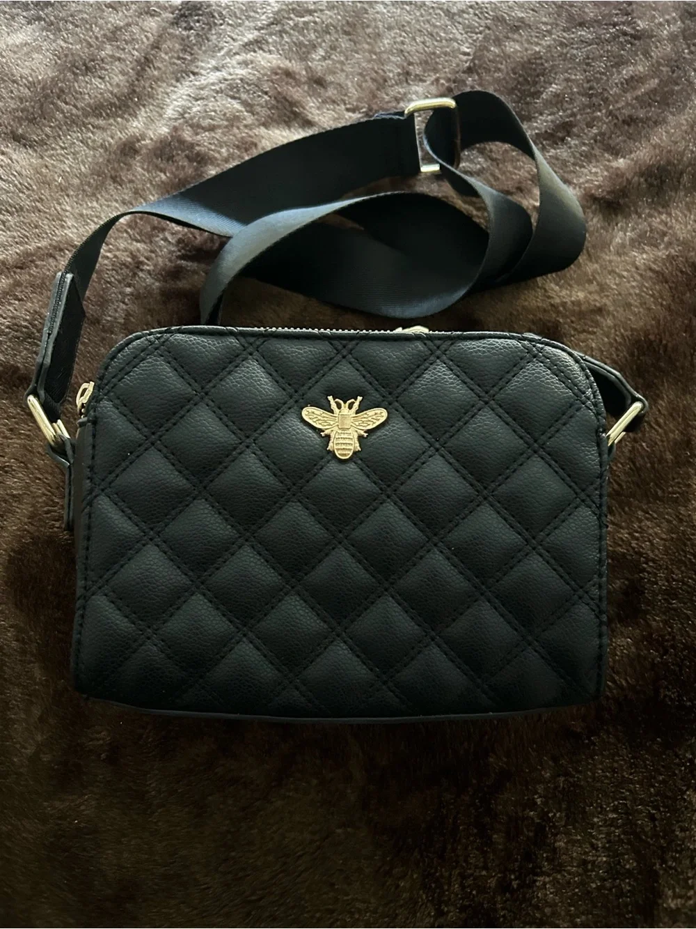 Black Quilted Crossbody Bag with Gold Bee Accent